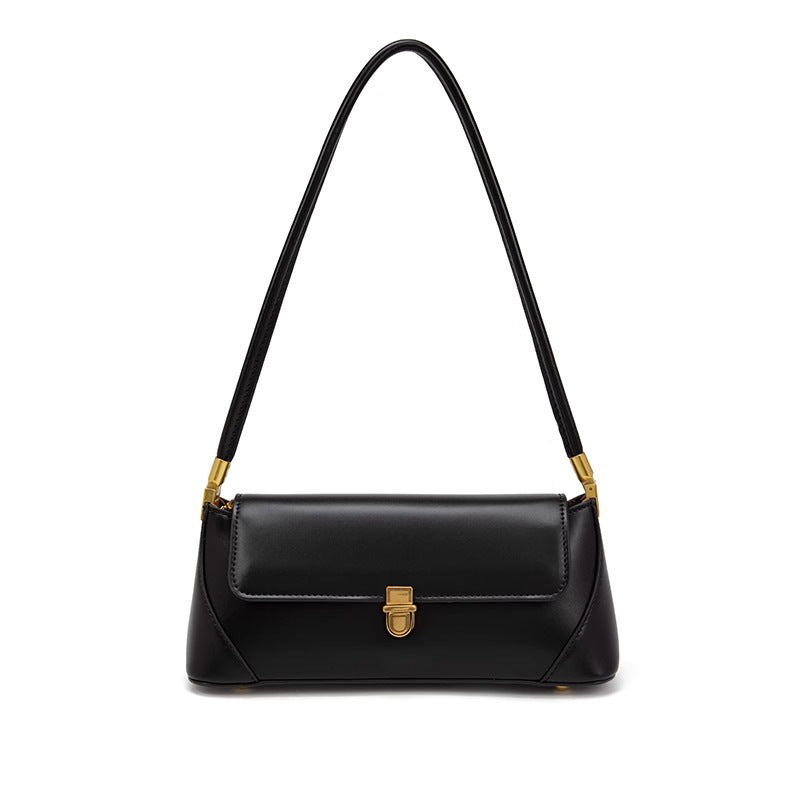 Bolsa Nicole baguette em material sintético premium, elegante e atemporal. Design clean com alça de ombro, toque macio e estrutura firme para qualquer ocasião.