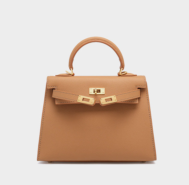 Bolsa Helena em couro legítimo, pequena, elegante e durável. Design clássico inspirado em Grace Kelly, perfeita para quem busca sofisticação atemporal.