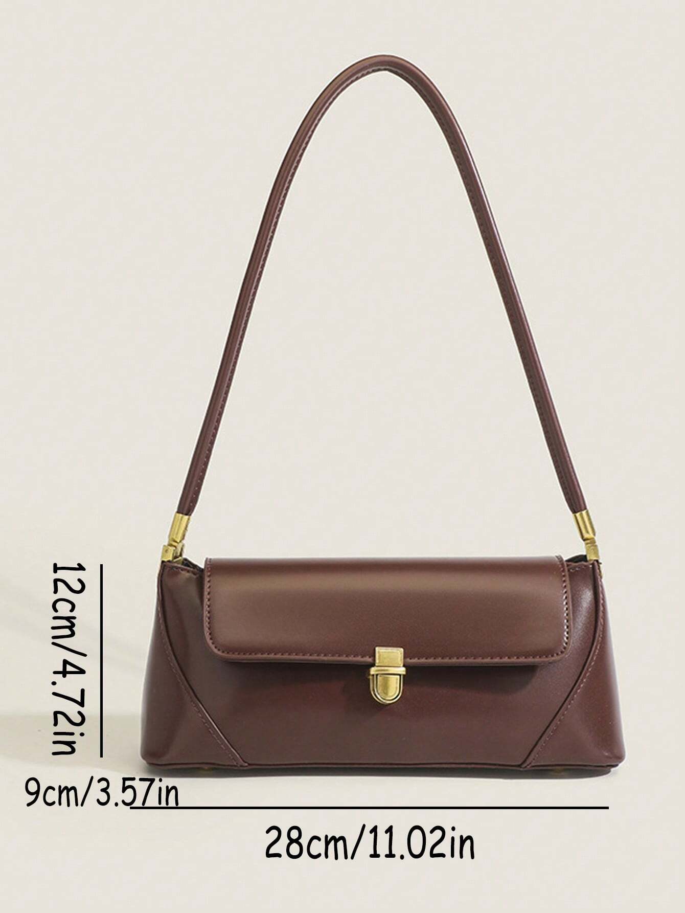 Bolsa Nicole baguette em material sintético premium, elegante e atemporal. Design clean com alça de ombro, toque macio e estrutura firme para qualquer ocasião.