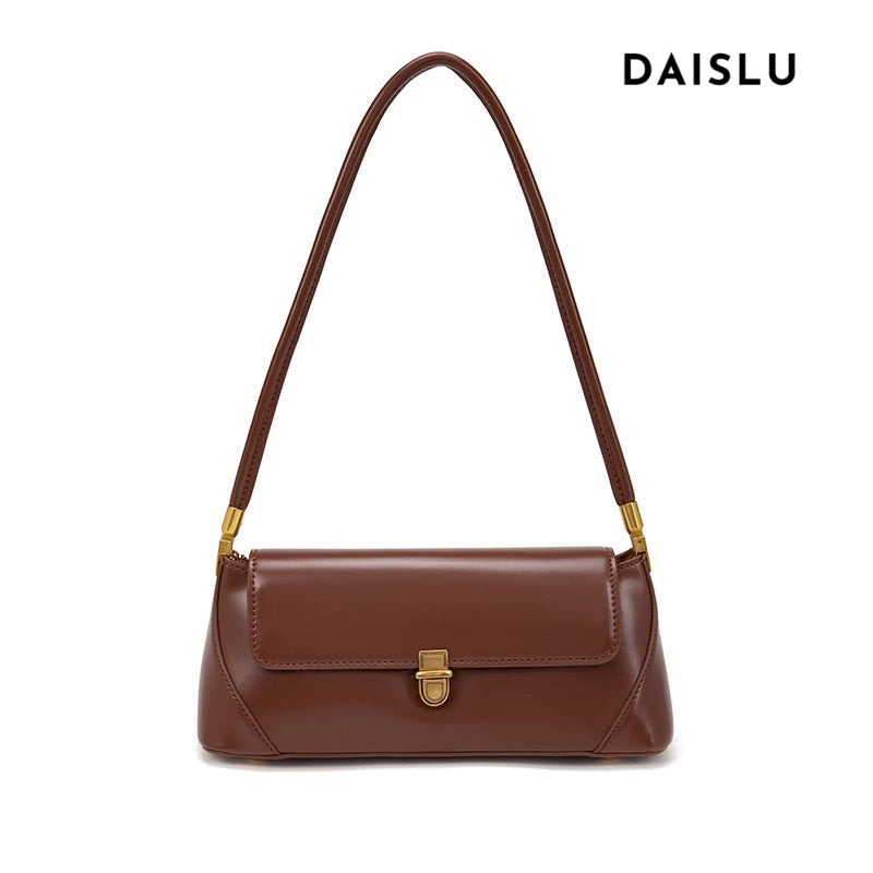 Bolsa Nicole baguette em material sintético premium, elegante e atemporal. Design clean com alça de ombro, toque macio e estrutura firme para qualquer ocasião.