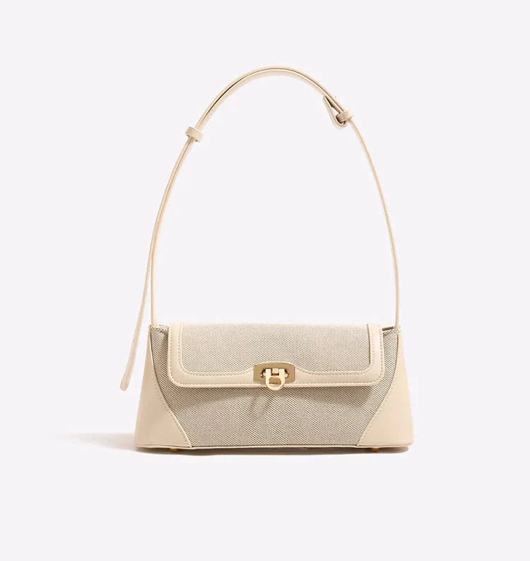 A Bolsa Isabele tem estilo baguete, elegante e funcional. Compacta por fora e espaçosa por dentro, é ideal para o verão e combina com looks casuais ou sofisticados.