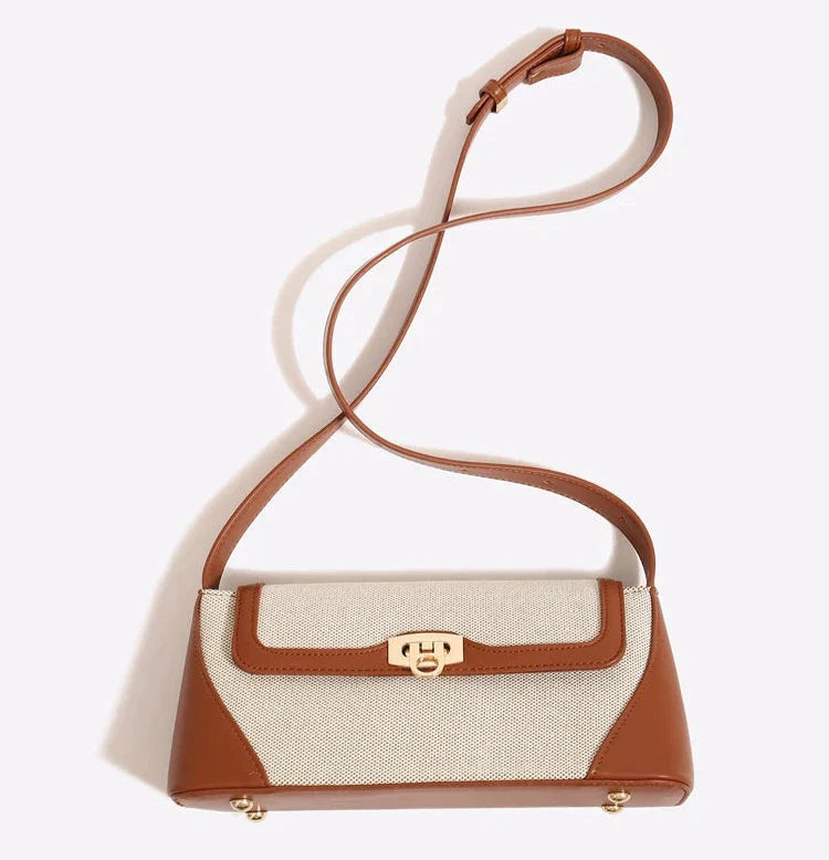 A Bolsa Isabele tem estilo baguete, elegante e funcional. Compacta por fora e espaçosa por dentro, é ideal para o verão e combina com looks casuais ou sofisticados.