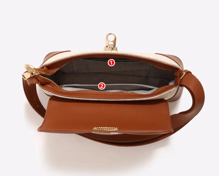 A Bolsa Isabele tem estilo baguete, elegante e funcional. Compacta por fora e espaçosa por dentro, é ideal para o verão e combina com looks casuais ou sofisticados.