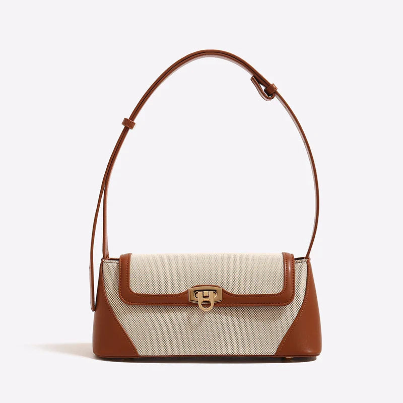 A Bolsa Isabele tem estilo baguete, elegante e funcional. Compacta por fora e espaçosa por dentro, é ideal para o verão e combina com looks casuais ou sofisticados.