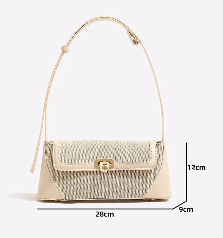 A Bolsa Isabele tem estilo baguete, elegante e funcional. Compacta por fora e espaçosa por dentro, é ideal para o verão e combina com looks casuais ou sofisticados.