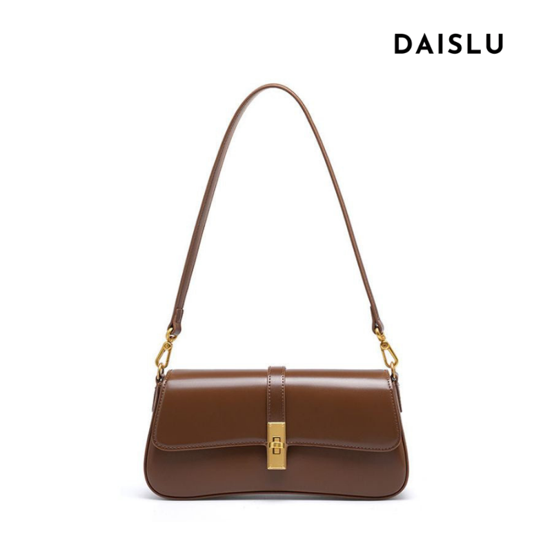 Bolsa Ana em couro legítimo, estilo baguette. Compacta, elegante e resistente, com divisórias internas que garantem praticidade e organização no dia a dia.