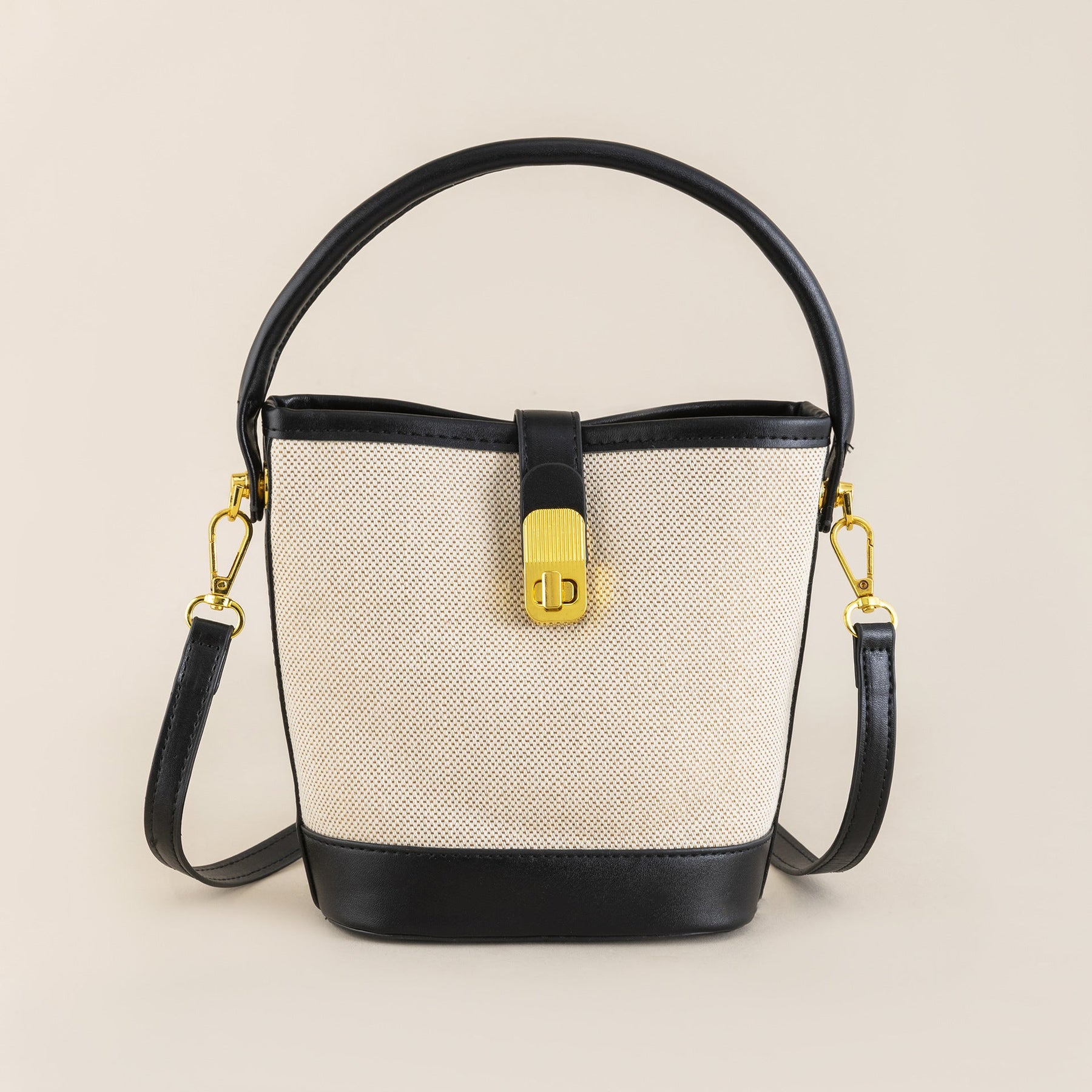 Bolsa Isabela estilo bucket em material sintético premium. Moderna, leve e sofisticada, com design minimalista e ótimo espaço interno para o dia a dia.