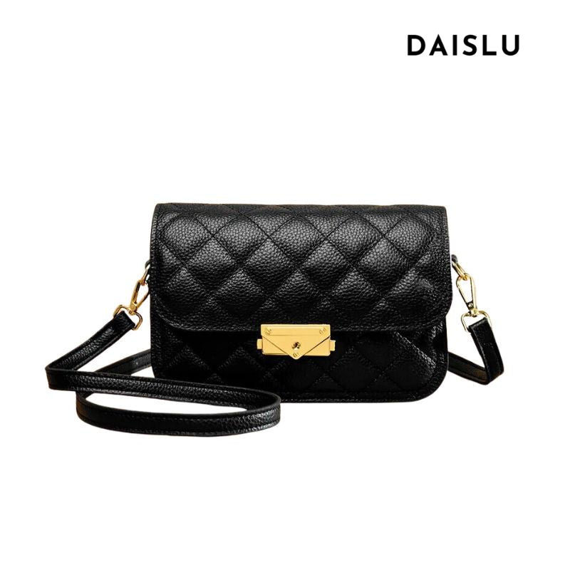 Bolsa Cecília em couro legítimo, com design box estruturado e textura matelassê. Sofisticada, durável e elegante, perfeita para looks atemporais.