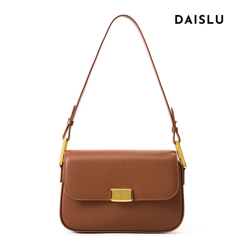 Bolsa Jack em couro legítimo, compacta e moderna. Modelo box bag com botão de encaixe e bolsos internos, une praticidade, estilo e organização no dia a dia.