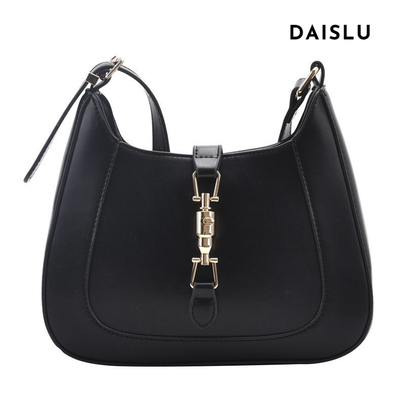 Bolsa Louise em material sintético com toque de couro, compacta e elegante. Espaçosa, prática e ideal para o dia a dia com estilo e sofisticação.