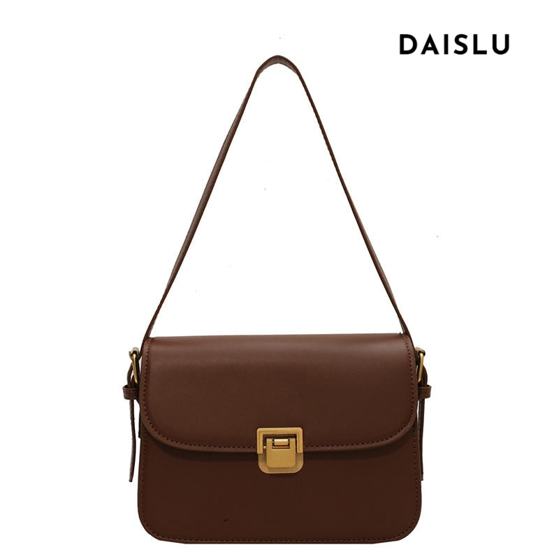 Bolsa Rebeca com textura em couro, compacta, elegante e versátil. Ideal para o dia a dia, com ótimo espaço interno para itens essenciais.