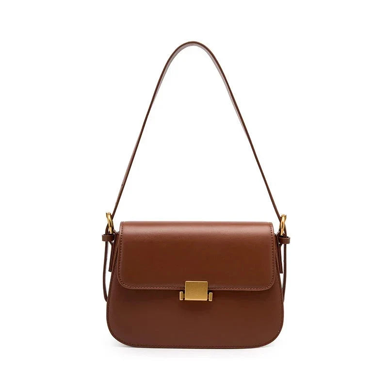 Bolsa Samira em couro legítimo, compacta e elegante. Modelo box bag com bolsos internos, ideal para mulheres que buscam estilo e praticidade no dia a dia.