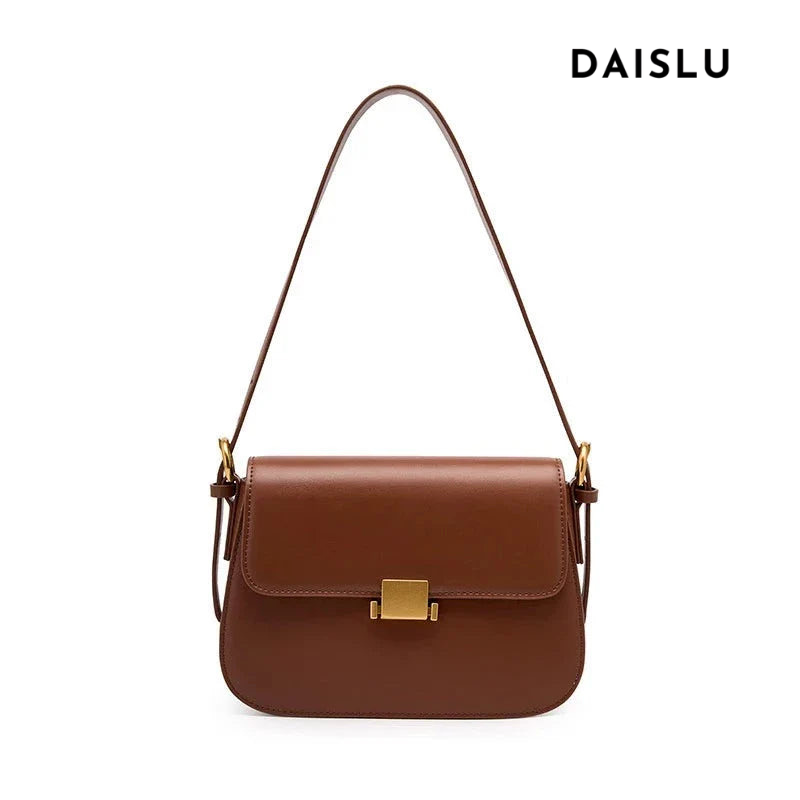 Bolsa Samira em couro legítimo, compacta e elegante. Modelo box bag com bolsos internos, ideal para mulheres que buscam estilo e praticidade no dia a dia.