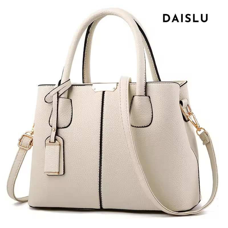 A Bolsa em Couro Sabrina exala sofisticação e minimalismo atemporal. Ela é confeccionada em couro de textura suave e uniforme, transmitindo um ar de discrição refinada.