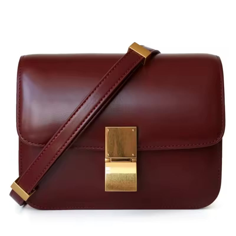 Bolsa Cristine compacta, elegante e funcional. Com divisórias, zíper e ferragens douradas, é ideal para o dia a dia ou ocasiões especiais.