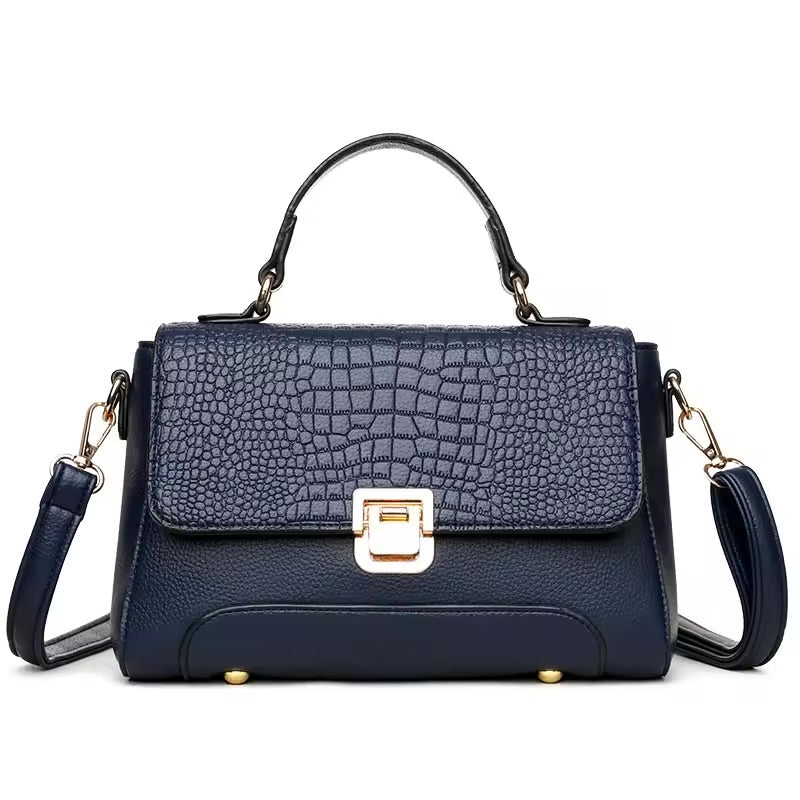 Bolsa Kelly média, elegante e funcional, com alças confortáveis e design clássico. Versátil e sofisticada, ideal para o dia a dia ou ocasiões especiais.