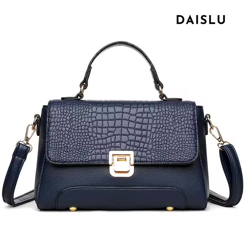 Bolsa Kelly média, elegante e funcional, com alças confortáveis e design clássico. Versátil e sofisticada, ideal para o dia a dia ou ocasiões especiais.