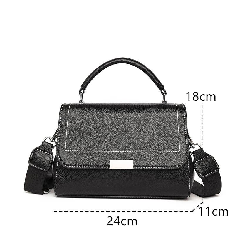 Bolsa Laura em couro legítimo, compacta, elegante e versátil. Com alça ajustável, zíper, botão magnético e divisórias para praticidade no dia a dia.