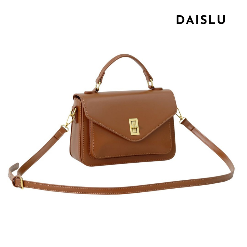 Bolsa Raquel em material sintético premium, elegante e moderna. Resistente, com ferragens douradas envelhecidas e design versátil para o dia a dia.