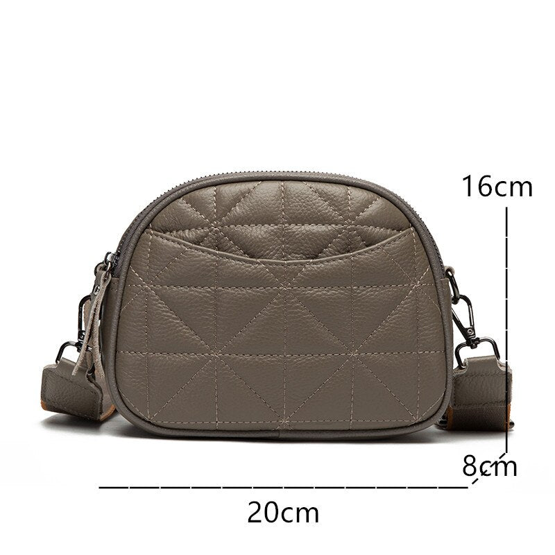 Bolsa Rayza em couro legítimo, compacta, elegante e funcional. Ideal para o dia a dia, com espaço interno bem distribuído para itens essenciais.