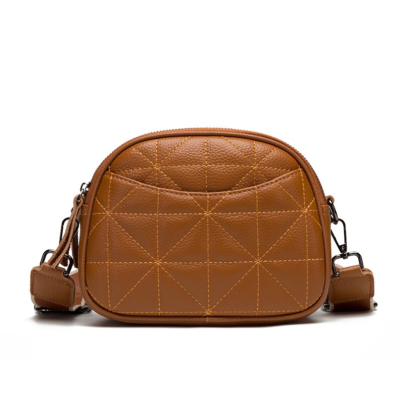 Bolsa Rayza em couro legítimo, compacta, elegante e funcional. Ideal para o dia a dia, com espaço interno bem distribuído para itens essenciais.