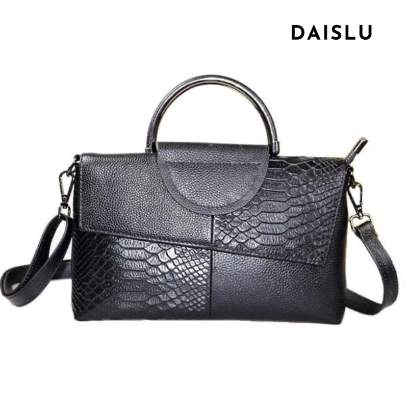 Bolsa Ísis em couro legítimo, elegante e funcional. Toque macio, design refinado e compartimentos internos ideais para organizar com estilo e praticidade.