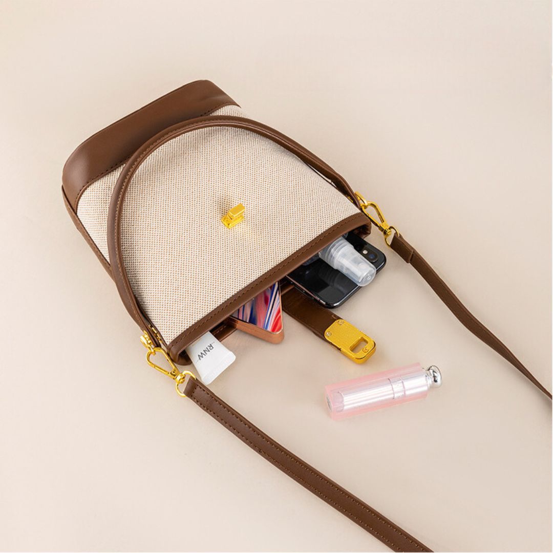 Bolsa Isabela estilo bucket em material sintético premium. Moderna, leve e sofisticada, com design minimalista e ótimo espaço interno para o dia a dia.