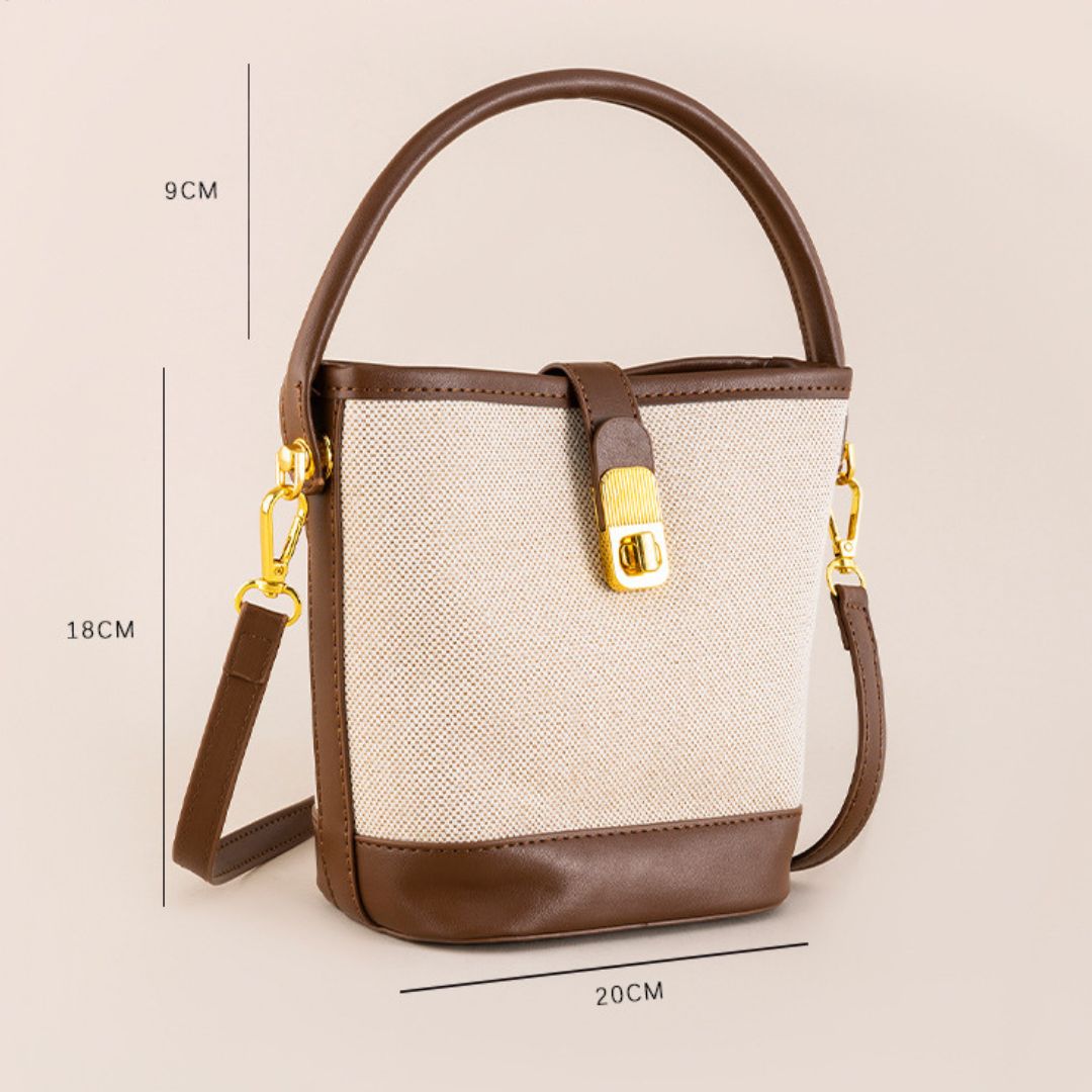 Bolsa Isabela estilo bucket em material sintético premium. Moderna, leve e sofisticada, com design minimalista e ótimo espaço interno para o dia a dia.