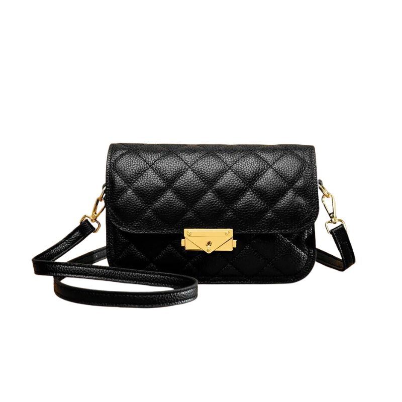 Bolsa Cecília em couro legítimo, com design box estruturado e textura matelassê. Sofisticada, durável e elegante, perfeita para looks atemporais.