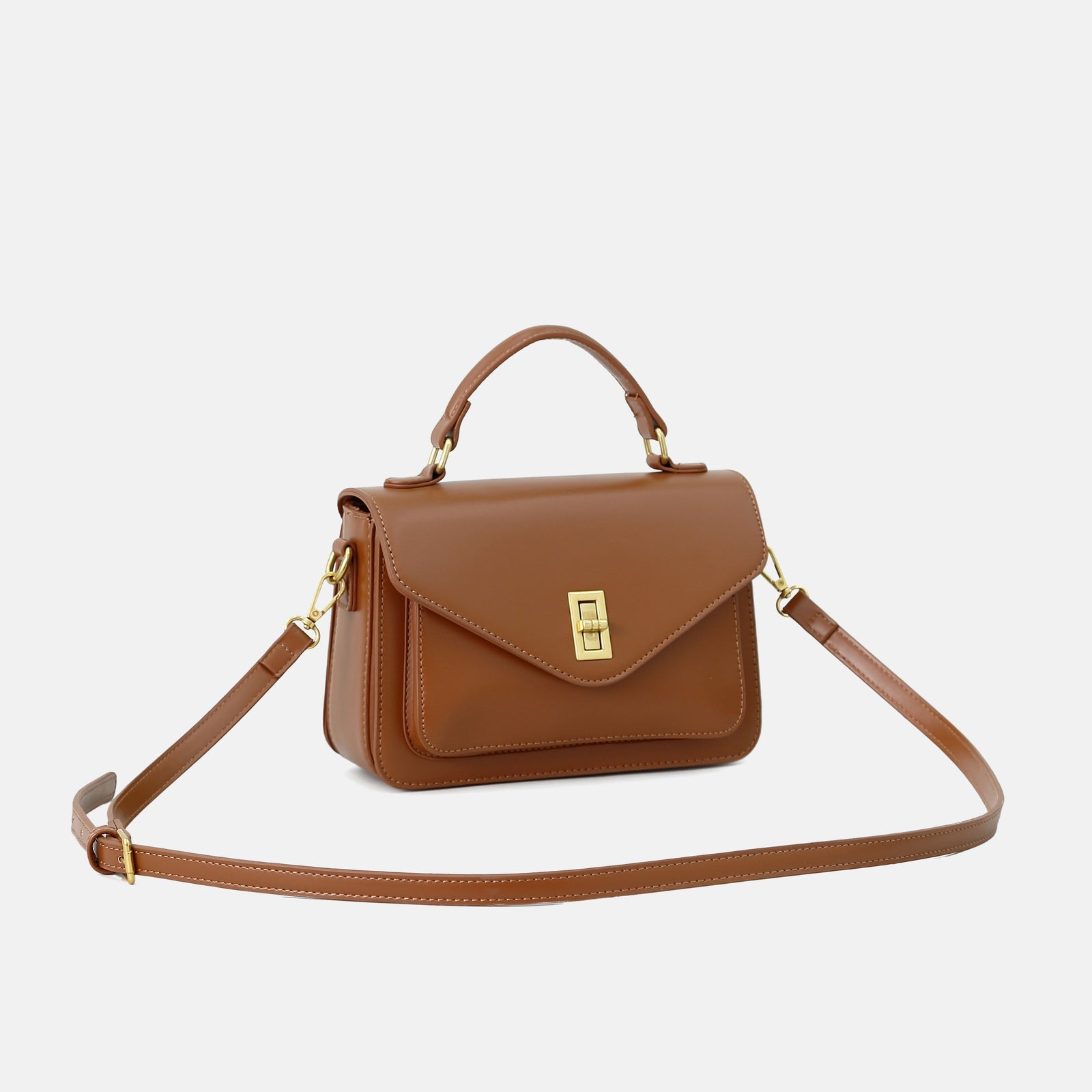 Bolsa Raquel em material sintético premium, elegante e moderna. Resistente, com ferragens douradas envelhecidas e design versátil para o dia a dia.