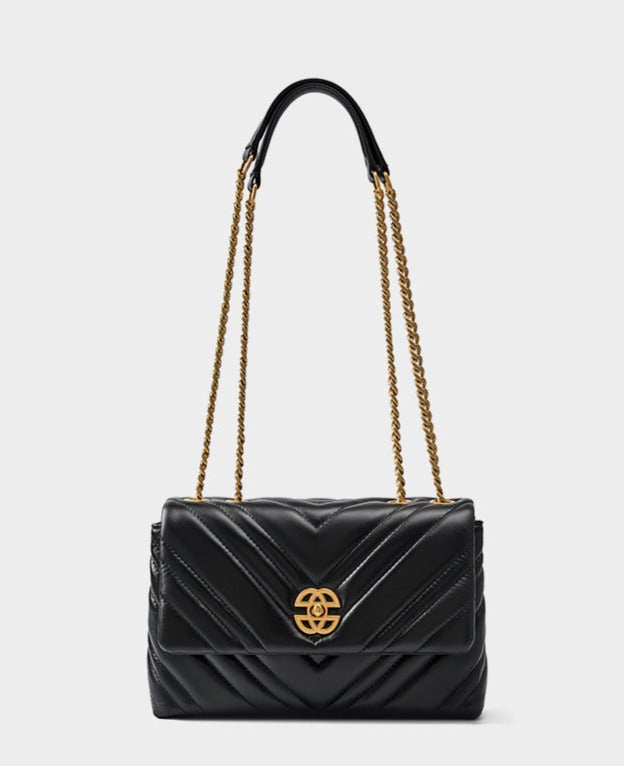 Bolsa Zoe em couro legítimo, média e elegante, com design matelassê. Versátil, espaçosa e segura, ideal para o dia a dia, viagens ou eventos especiais.