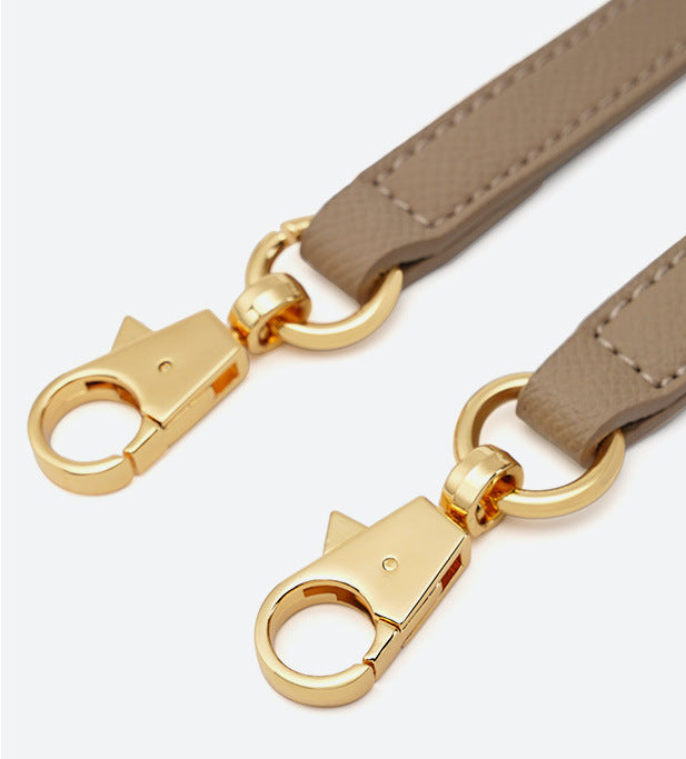 Bolsa Helena em couro legítimo, pequena, elegante e durável. Design clássico inspirado em Grace Kelly, perfeita para quem busca sofisticação atemporal.