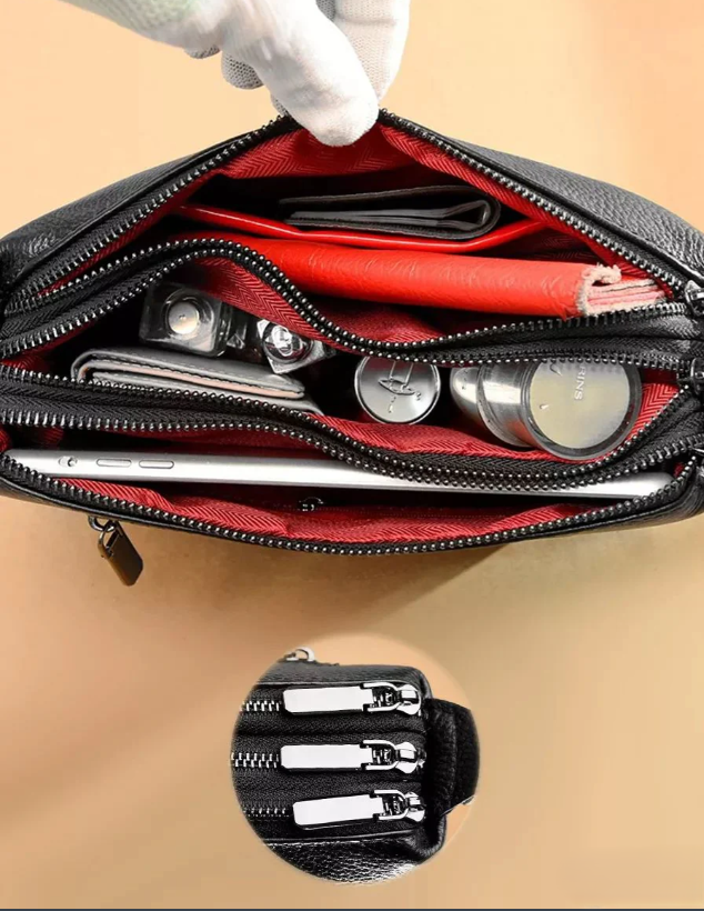 Bolsa Pietra em couro legítimo, compacta, elegante e resistente. Alça ajustável, zíper seguro e ótimo espaço interno para o dia a dia com estilo.