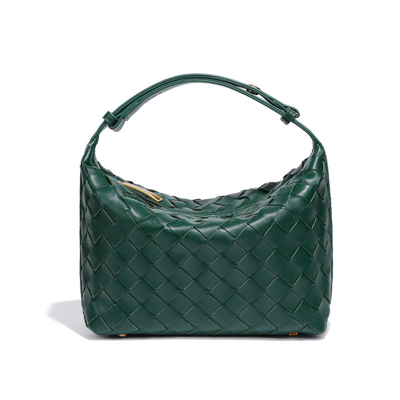 Bolsa Cleo com trama artesanal em material premium. Sofisticada, durável e elegante, com acabamento impecável e metais que destacam seu design exclusivo.