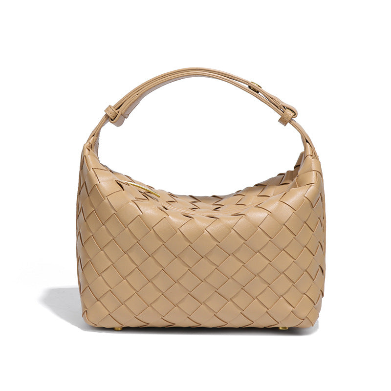 Bolsa Cleo com trama artesanal em material premium. Sofisticada, durável e elegante, com acabamento impecável e metais que destacam seu design exclusivo.
