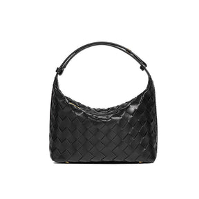 Bolsa Cleo com trama artesanal em material premium. Sofisticada, durável e elegante, com acabamento impecável e metais que destacam seu design exclusivo.