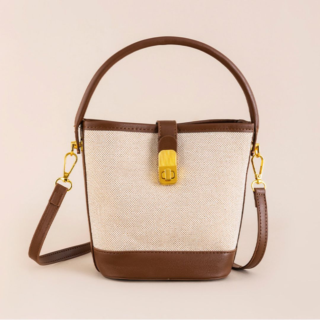 Bolsa Isabela estilo bucket em material sintético premium. Moderna, leve e sofisticada, com design minimalista e ótimo espaço interno para o dia a dia.