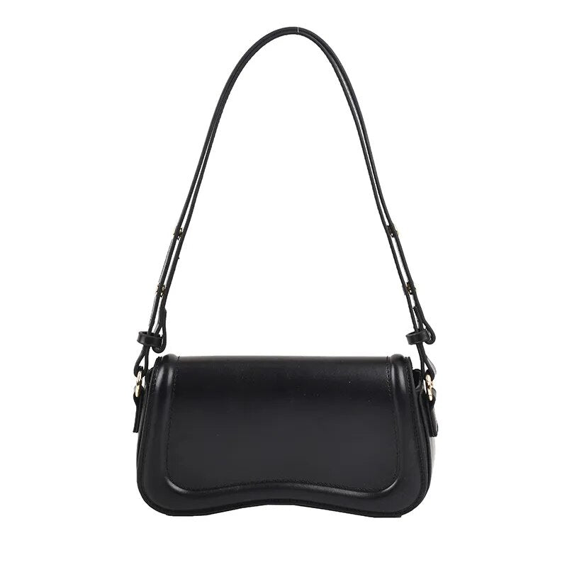 Bolsa Emily estilo baguete com design ondulado. Compacta, elegante e versátil, em material sintético com botão magnético e espaço ideal para o dia a dia.