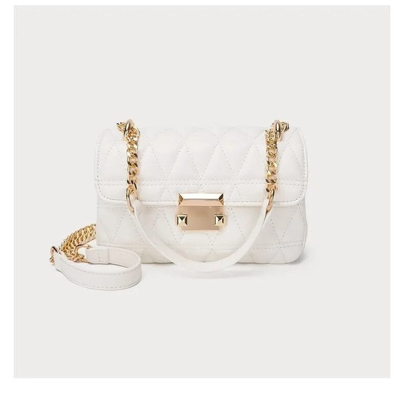 Bolsa Júlia com design estruturado e matelassê. Sofisticada e prática, feita em material sintético durável, ideal para o dia a dia ou ocasiões especiais.