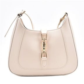 Bolsa Louise em material sintético com toque de couro, compacta e elegante. Espaçosa, prática e ideal para o dia a dia com estilo e sofisticação.