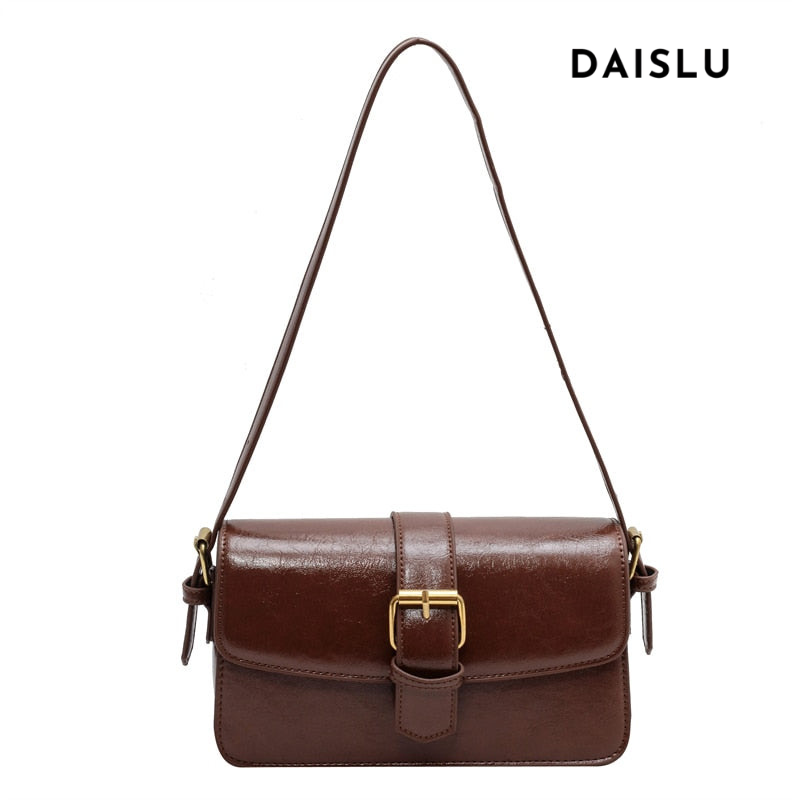 Bolsa Mary estilo baguete, feita em material sintético premium. Compacta, elegante e prática, com zíper, fivela decorativa e espaço para itens essenciais.