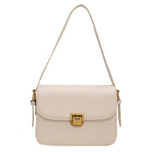Bolsa Rebeca com textura em couro, compacta, elegante e versátil. Ideal para o dia a dia, com ótimo espaço interno para itens essenciais.