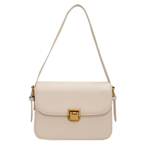 Bolsa Rebeca com textura em couro, compacta, elegante e versátil. Ideal para o dia a dia, com ótimo espaço interno para itens essenciais.