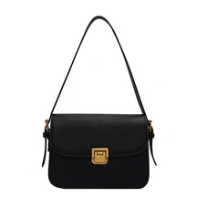 Bolsa Rebeca com textura em couro, compacta, elegante e versátil. Ideal para o dia a dia, com ótimo espaço interno para itens essenciais.