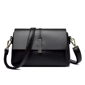 Bolsa Lara média, sofisticada e versátil, com design moderno e atemporal. Espaçosa, confortável e elegante, ideal para o dia a dia ou eventos especiais.