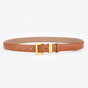 Cinto Ísis em couro legítimo com fivela dourada. Elegante, durável e versátil, ideal para looks casuais ou formais. Disponível em diversas cores.