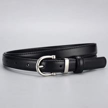 Cinto Ívina em couro legítimo com fivela prateada. Elegante, durável e versátil, com acabamento refinado e ideal para looks casuais ou formais.
