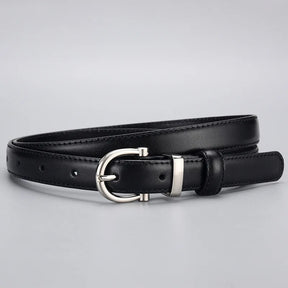Cinto Ívina em couro legítimo com fivela prateada. Elegante, durável e versátil, com acabamento refinado e ideal para looks casuais ou formais.
