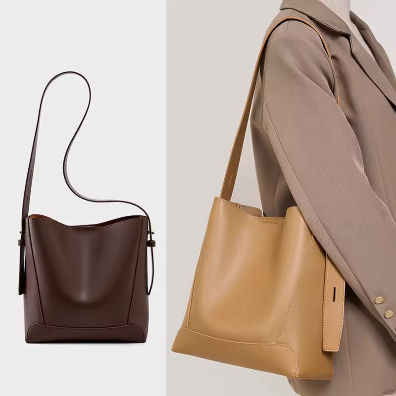 Bolsa Antonela estilo bucket em couro legítimo, elegante e atemporal. Funcional, com ferragens prata e design sofisticado para o dia a dia ou eventos.