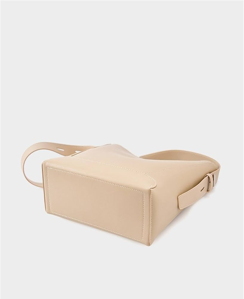 Bolsa Antonela estilo bucket em couro legítimo, elegante e atemporal. Funcional, com ferragens prata e design sofisticado para o dia a dia ou eventos.
